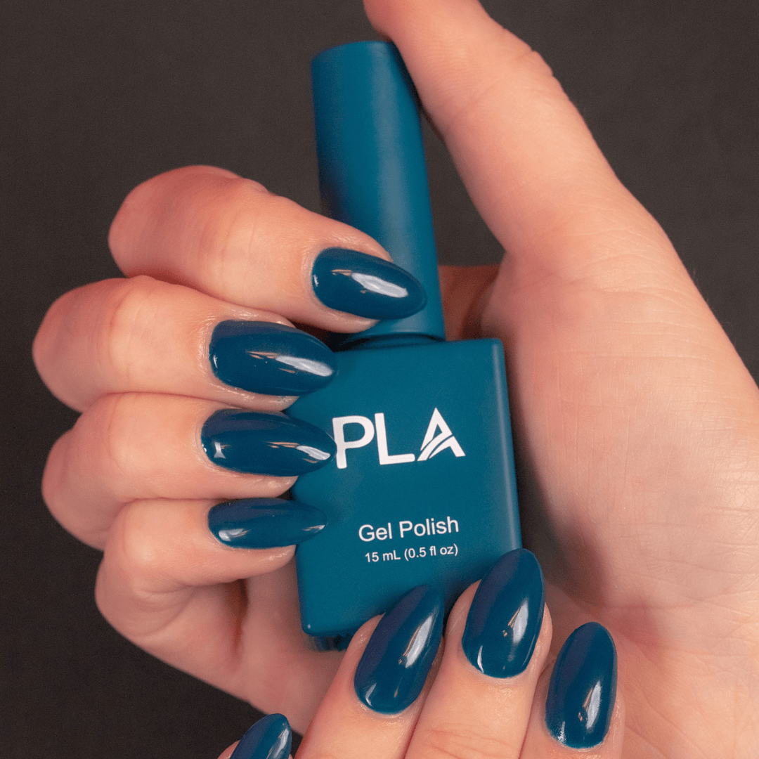 Jewel toned nail polish from PLA: Nails Before Males #184 (hands holding gel polish bottle)