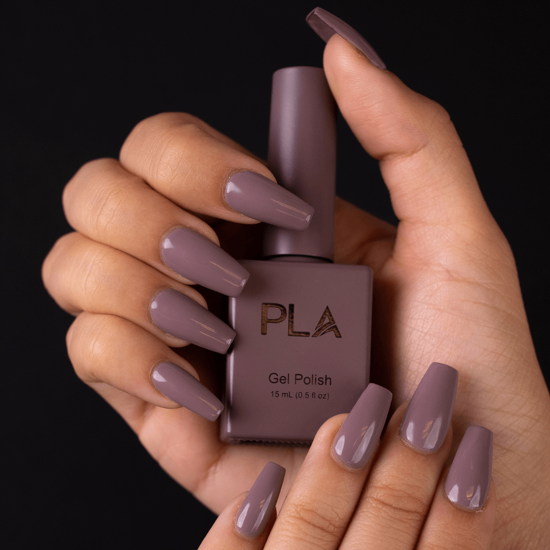 Purple gel nails from PLA: Box Of Chocolates #51 (hands holding gel polish bottle)